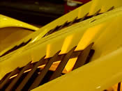 Close-up of yellow Lotus bodywork from the original EV website