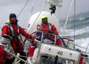 Sailing crew at a yacht’s helm, from the original marine-filming archive